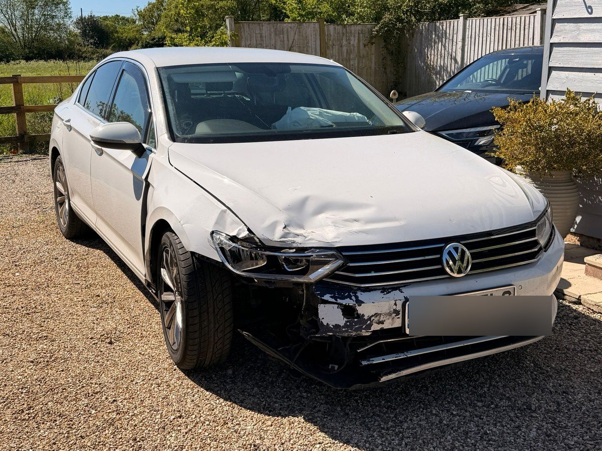 Volkswagen Passat with accident damage collected from Cambridge